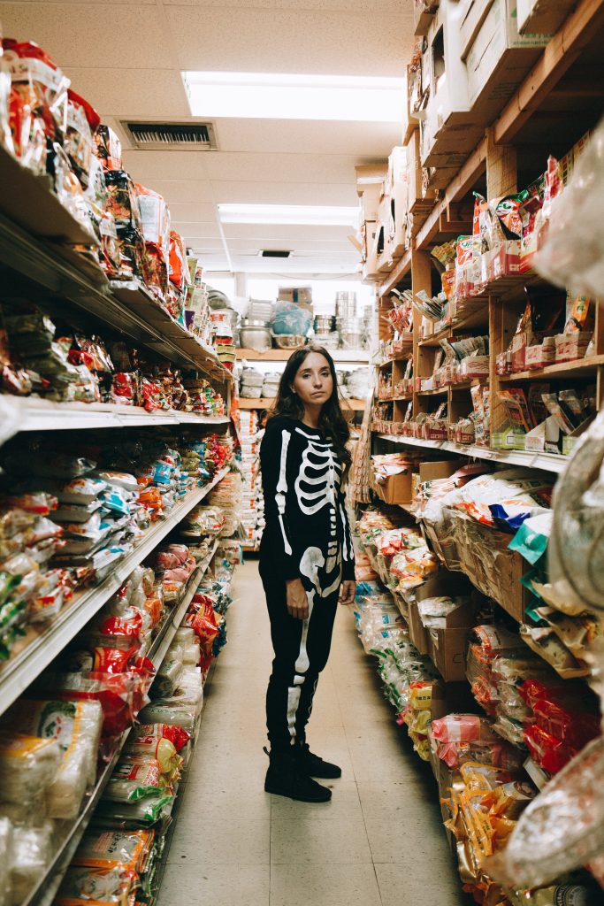 Sad skeleton in supermarket