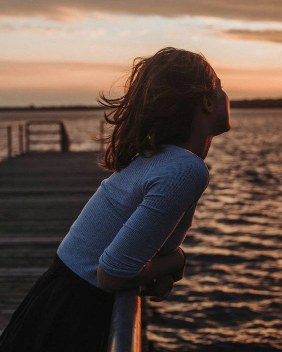 girl looking at sunrise