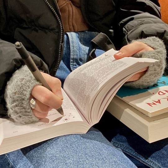 Writing in book