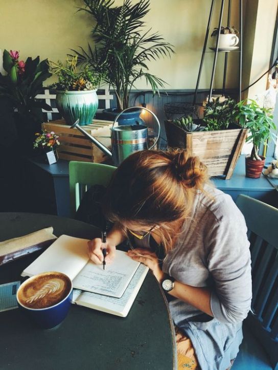 girl studying in cafe