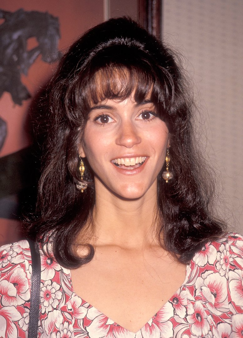 Beaming in a floral dress with gold drop earrings, Jami Gertz brought a burst of summer charm to the ABC Summer TCA Press Tour in Universal City.
