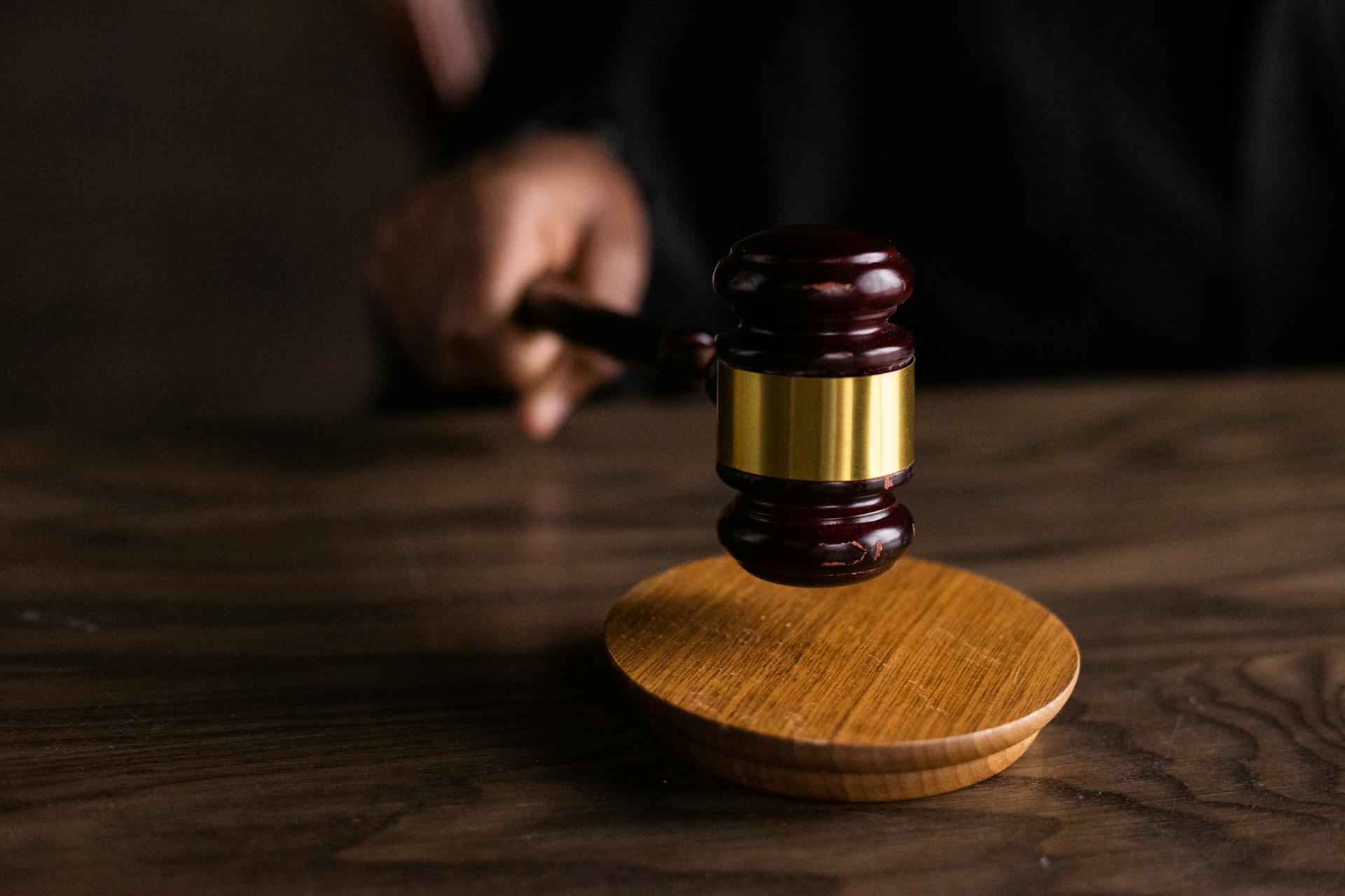 A close-up of a judge holding a gavel | Source: Pexels