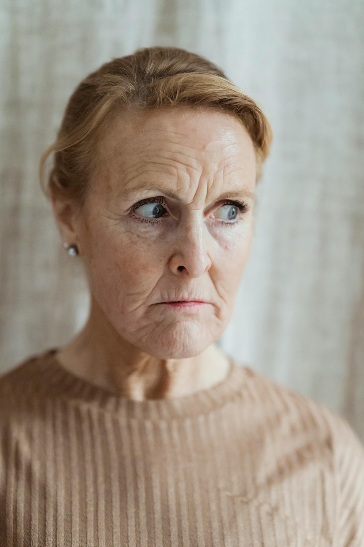 A stunned senior woman | Source: Pexels