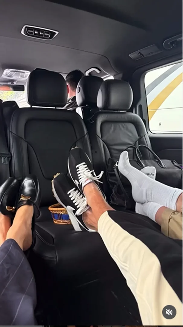 Meghan Markle rested her feet on the seat of a limo as she cruised through Parisian streets, including Pont Alexandre III and Pont des Invalides. Her route continues toward the Pont de l'Alma, the tunnel where Princess Diana lost her life in 1997. | Source: X/StephanieSidley