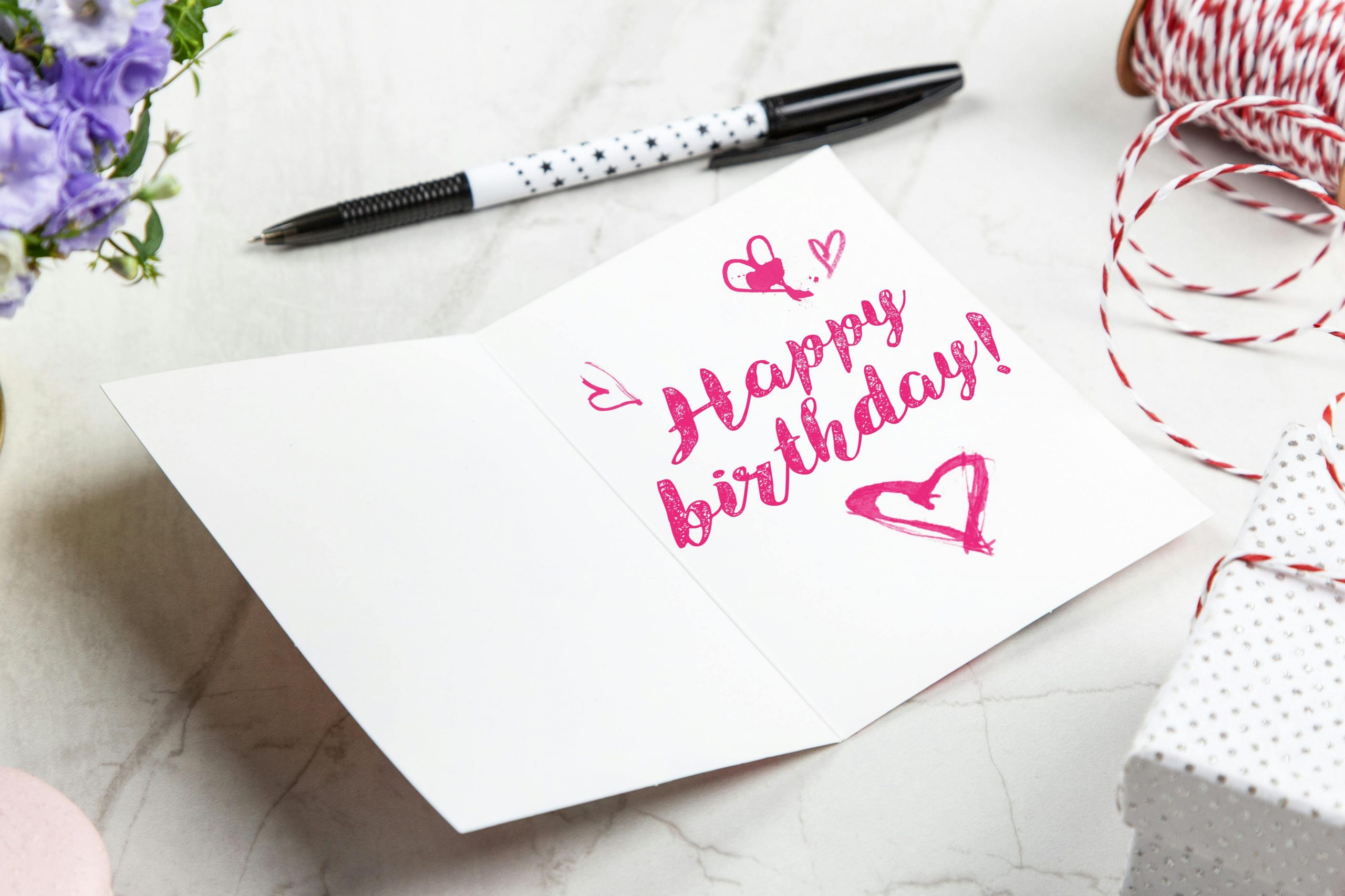 A birthday card with a pen next to it | Source: Pexels