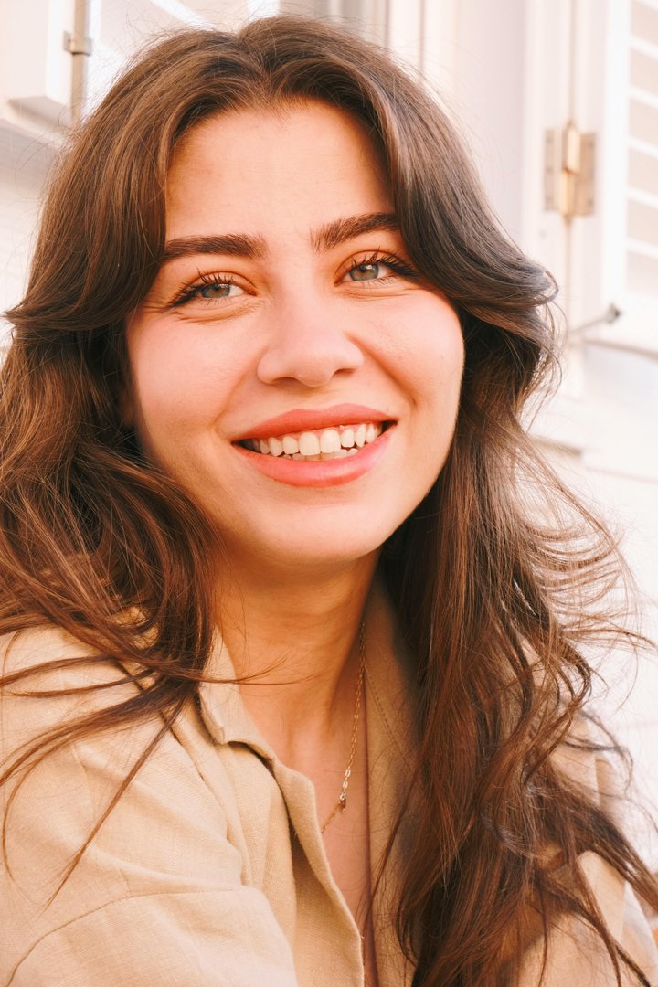 A woman smiling | Source: Pexels