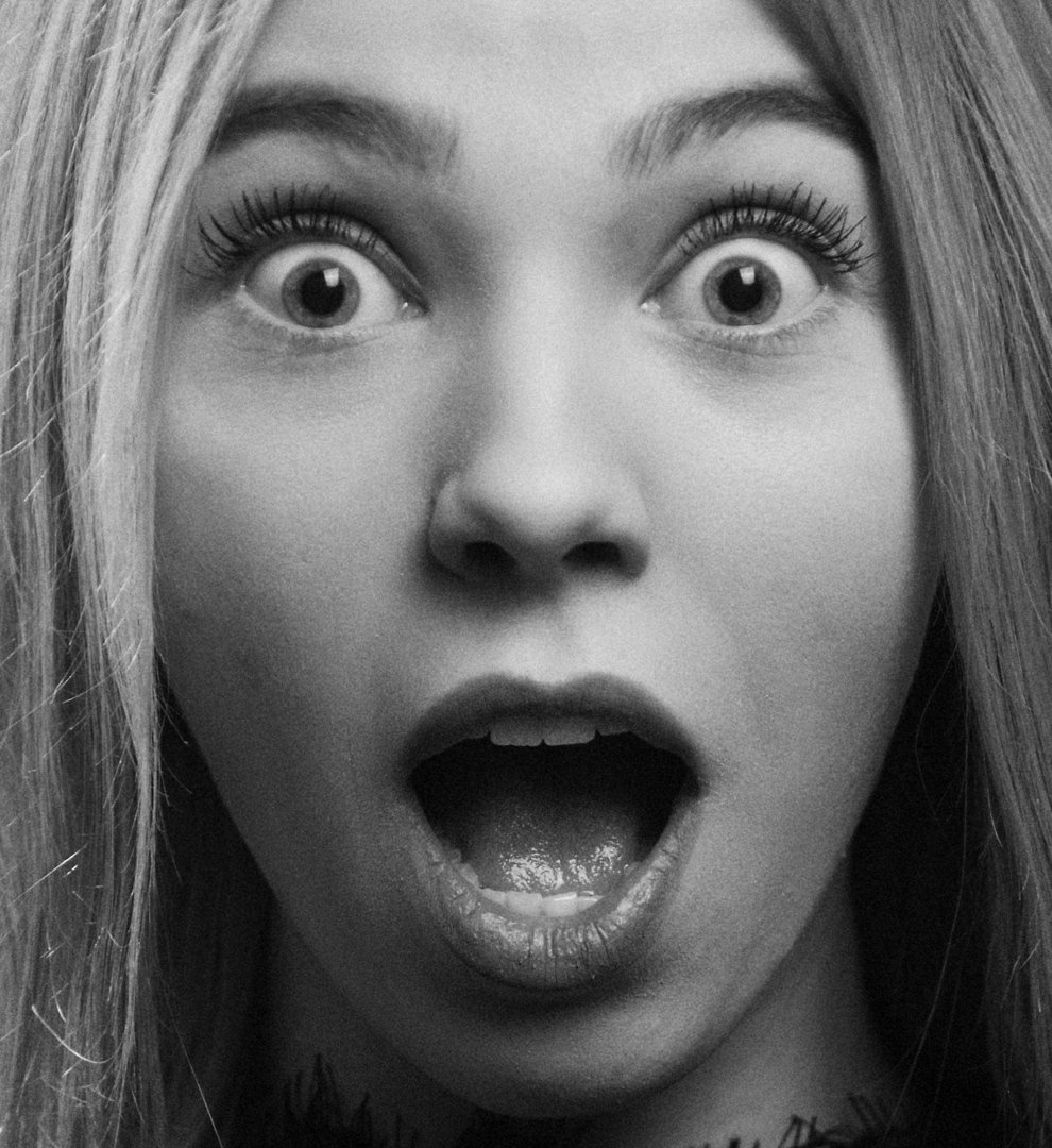A close-up of a shocked woman's face | Source: Pexels