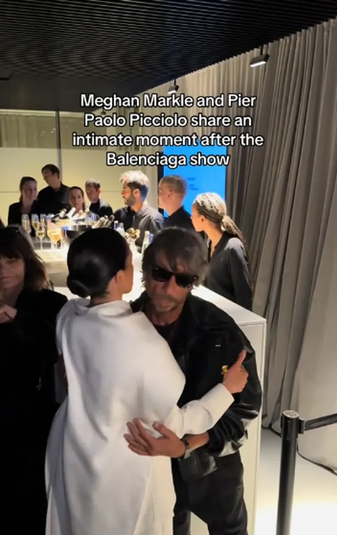 A slight miscalculation in timing between Meghan Markle and Pierpaolo Picciolo sends their faces startlingly close, teetering on the edge of an accidental kiss on the lips. | Source: TikTok/saintleon