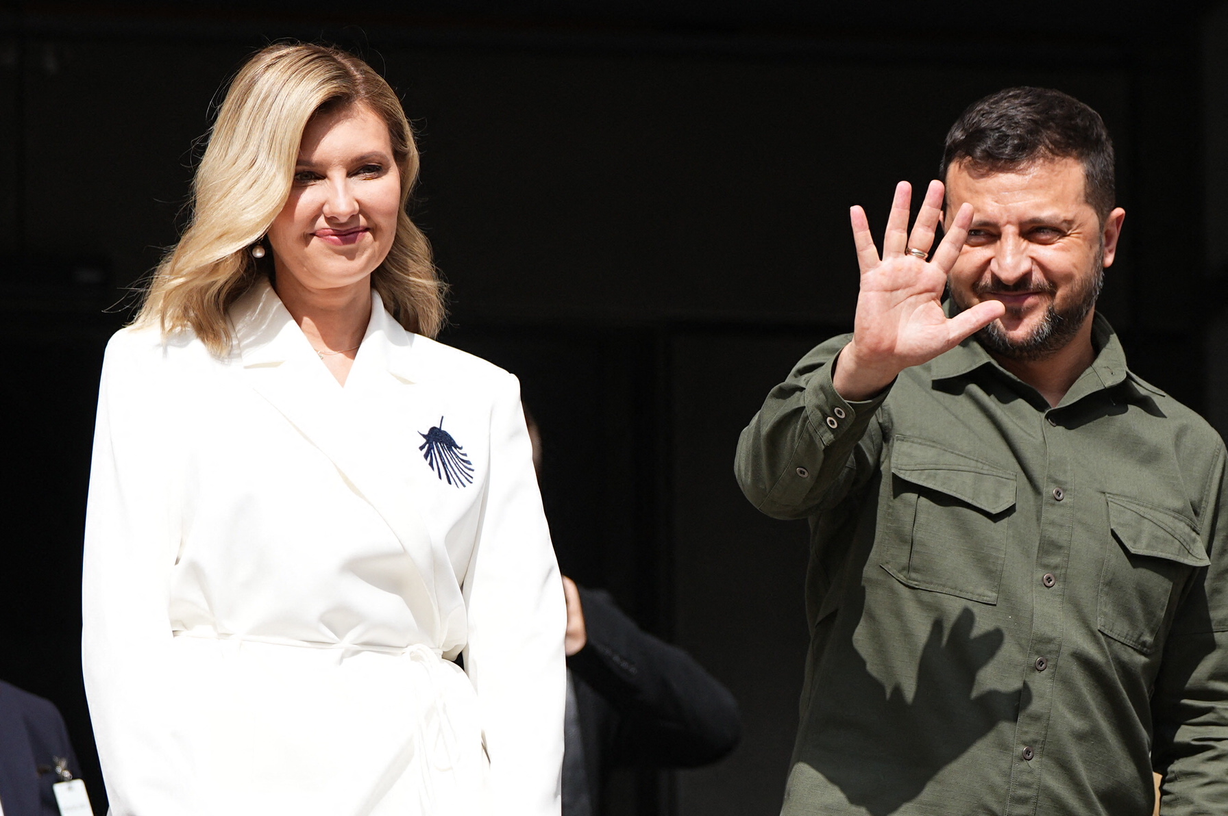 Volodymyr Zelenskyy stands next to Olena Zelenska and waves to the crowds in front of the Danish Parliament in Copenhagen, Denmark, on August 21, 2023 | Source: Getty Images