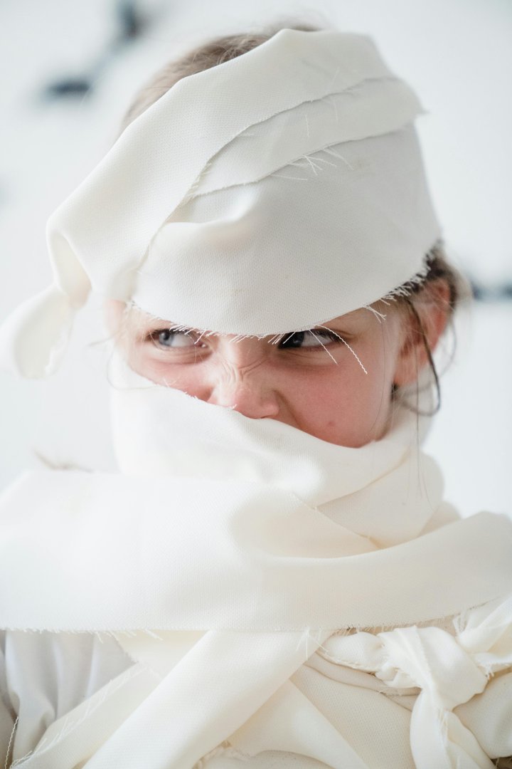 A little girl dressed in a mummy costume | Source: Pexels