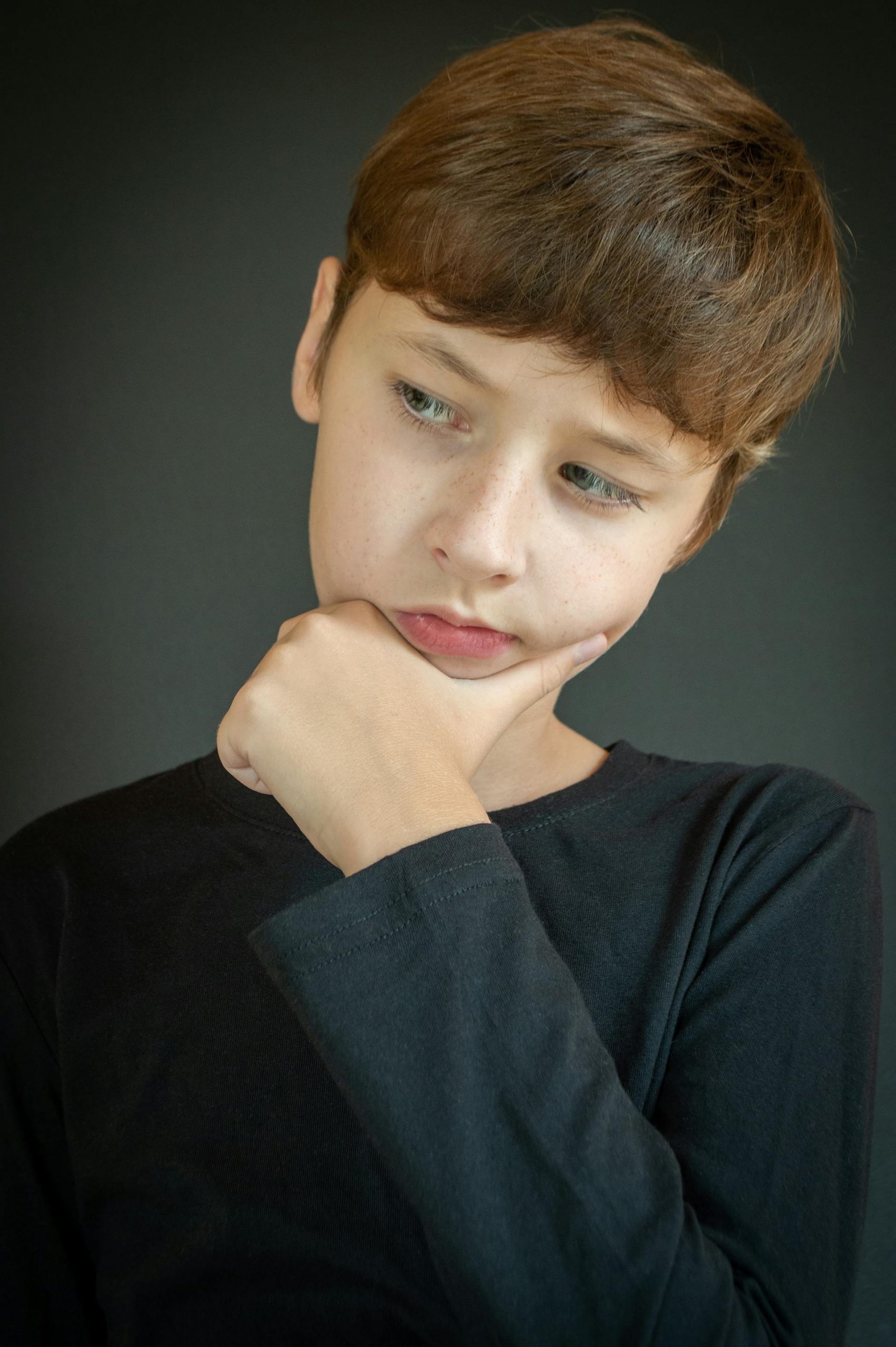 A thoughtful teenage boy | Source: Pexels