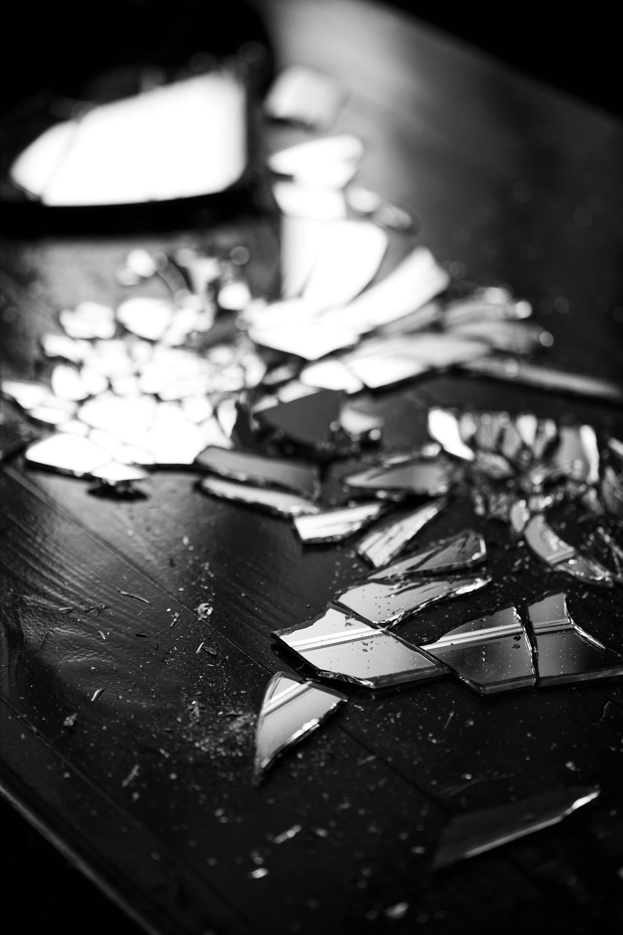 Glass shards on a surface | Source: Pexels