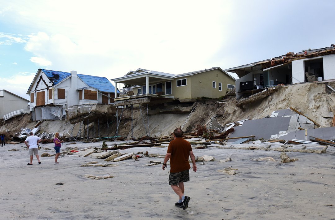 Homes damaged by coastal erosion after Hurricane Nicole's landfall in Florida, November 11, 2022 | Source: Getty Images