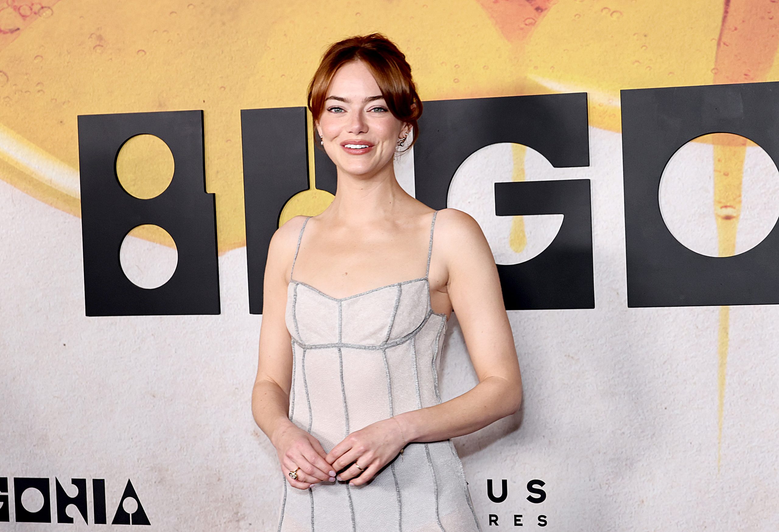 Emma Stone stands tall before the 