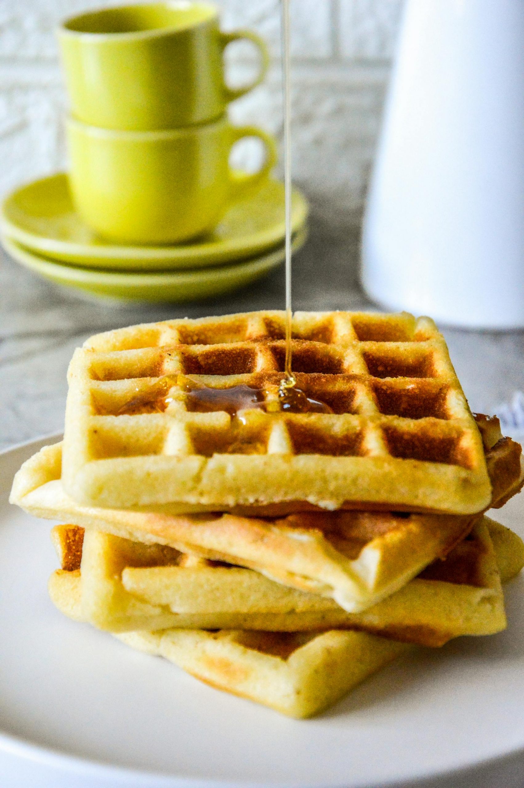 Golden waffles with syrup drizzle | Source: Pexels