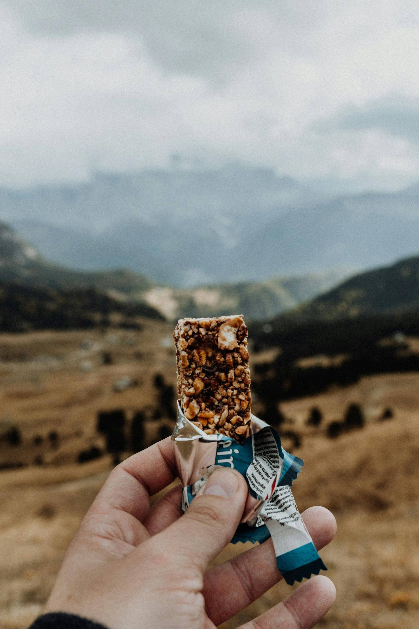 A person holding a cereal bar | Source: Pexels