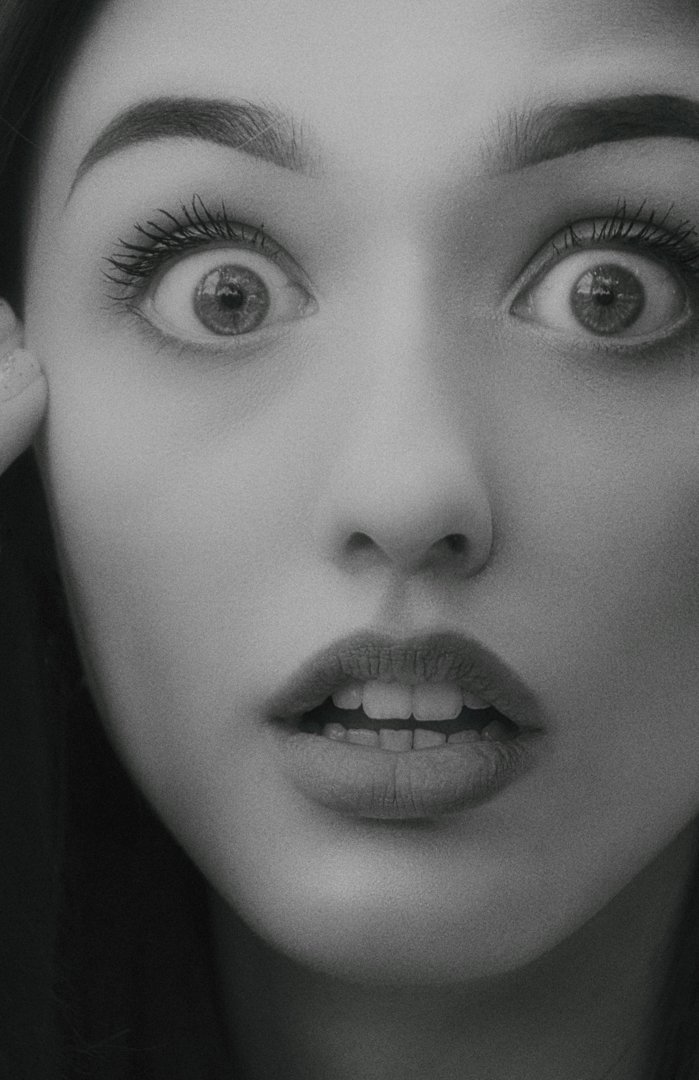 A close-up of a shocked woman's face | Source: Pexels