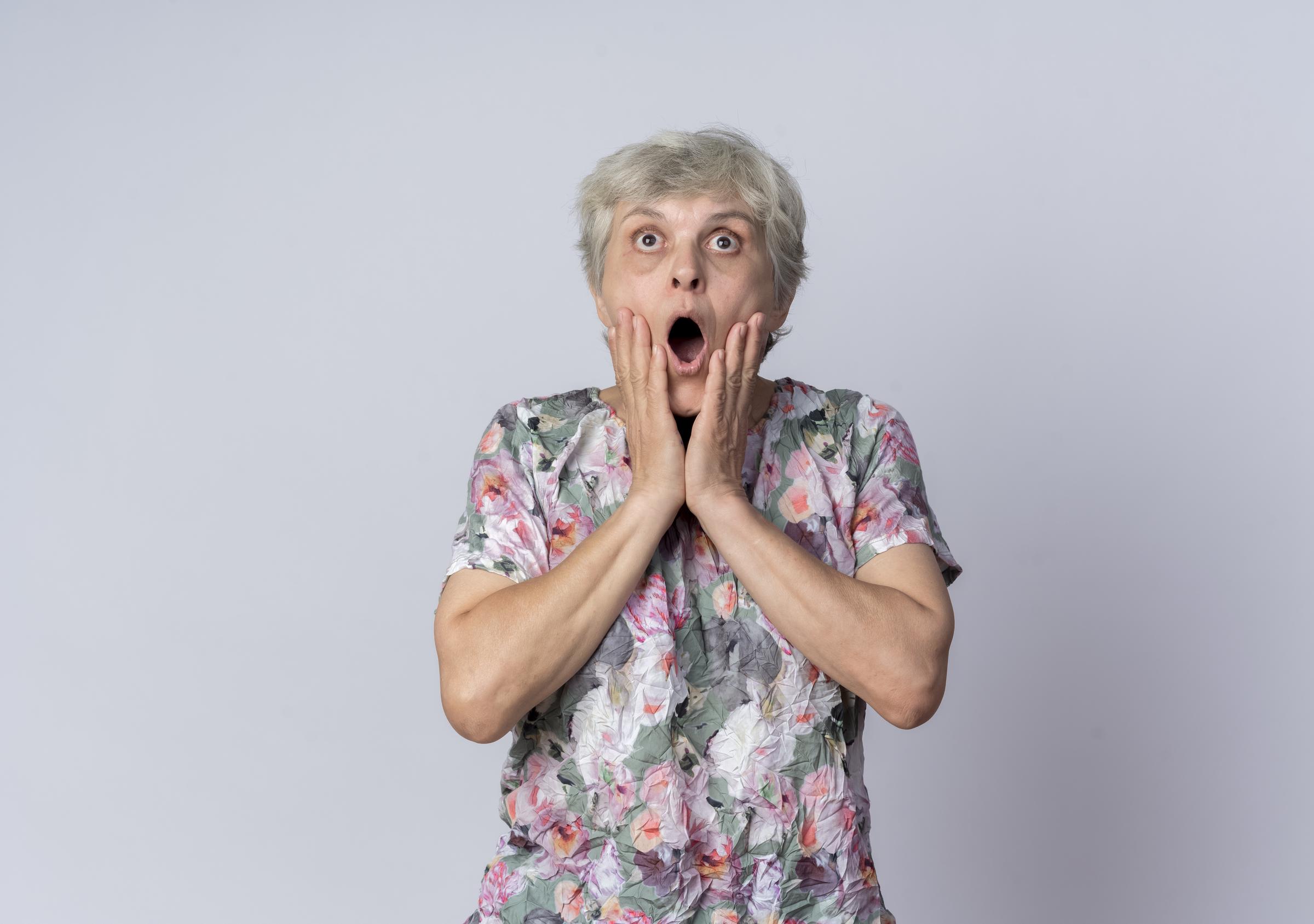 A shocked woman | Source: Freepik
