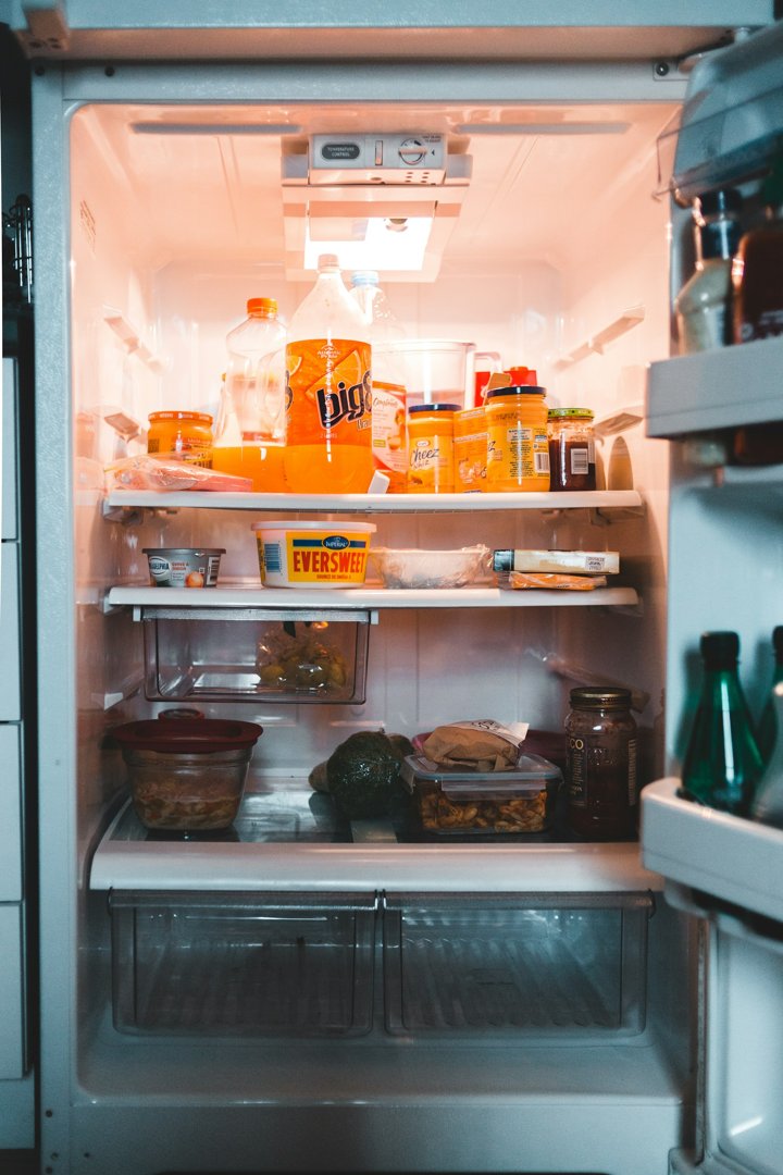 Food and drinks stocked in a refrigerator | Source: Unsplash