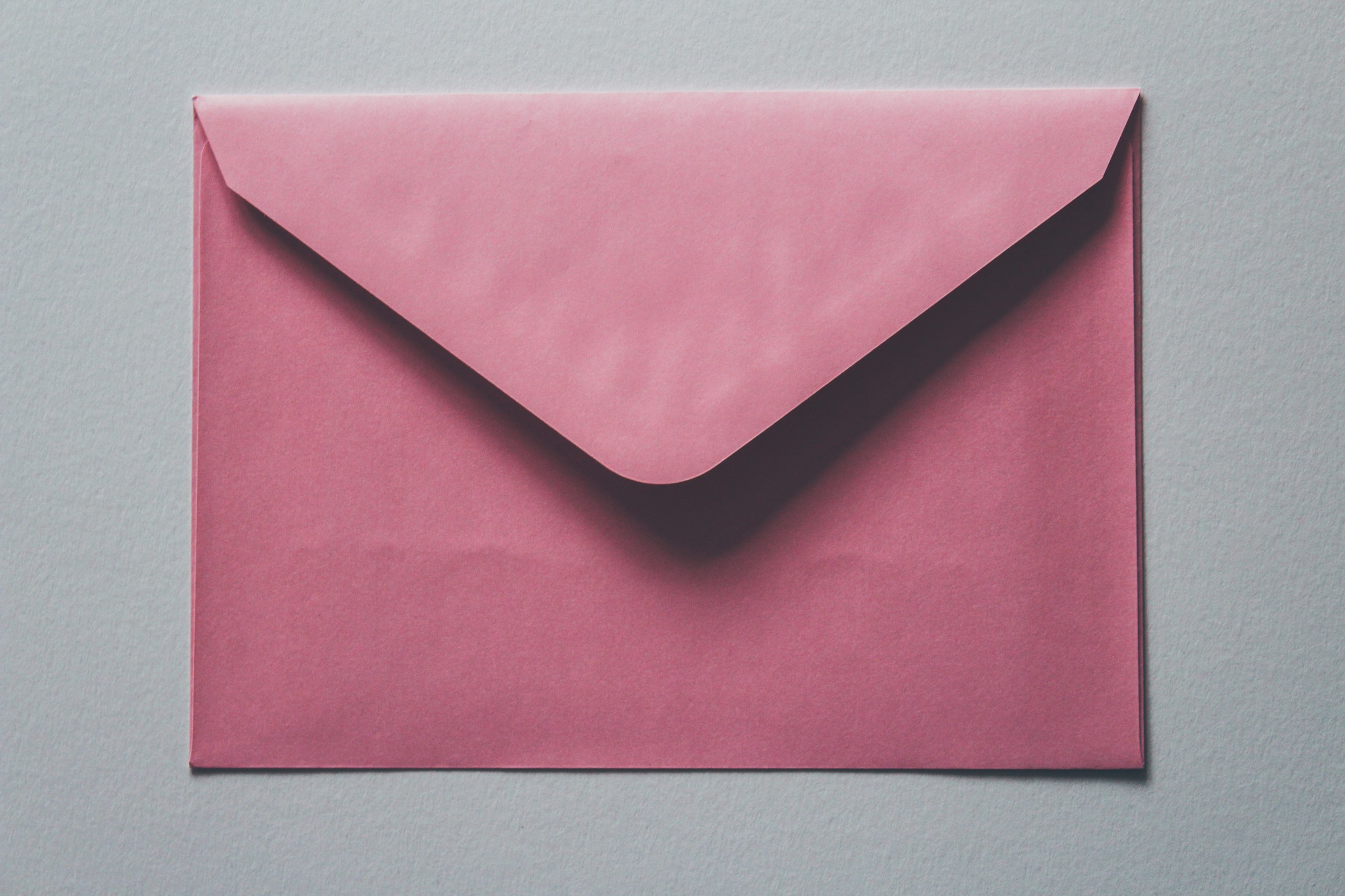 A pink envelope | Source: Unsplash