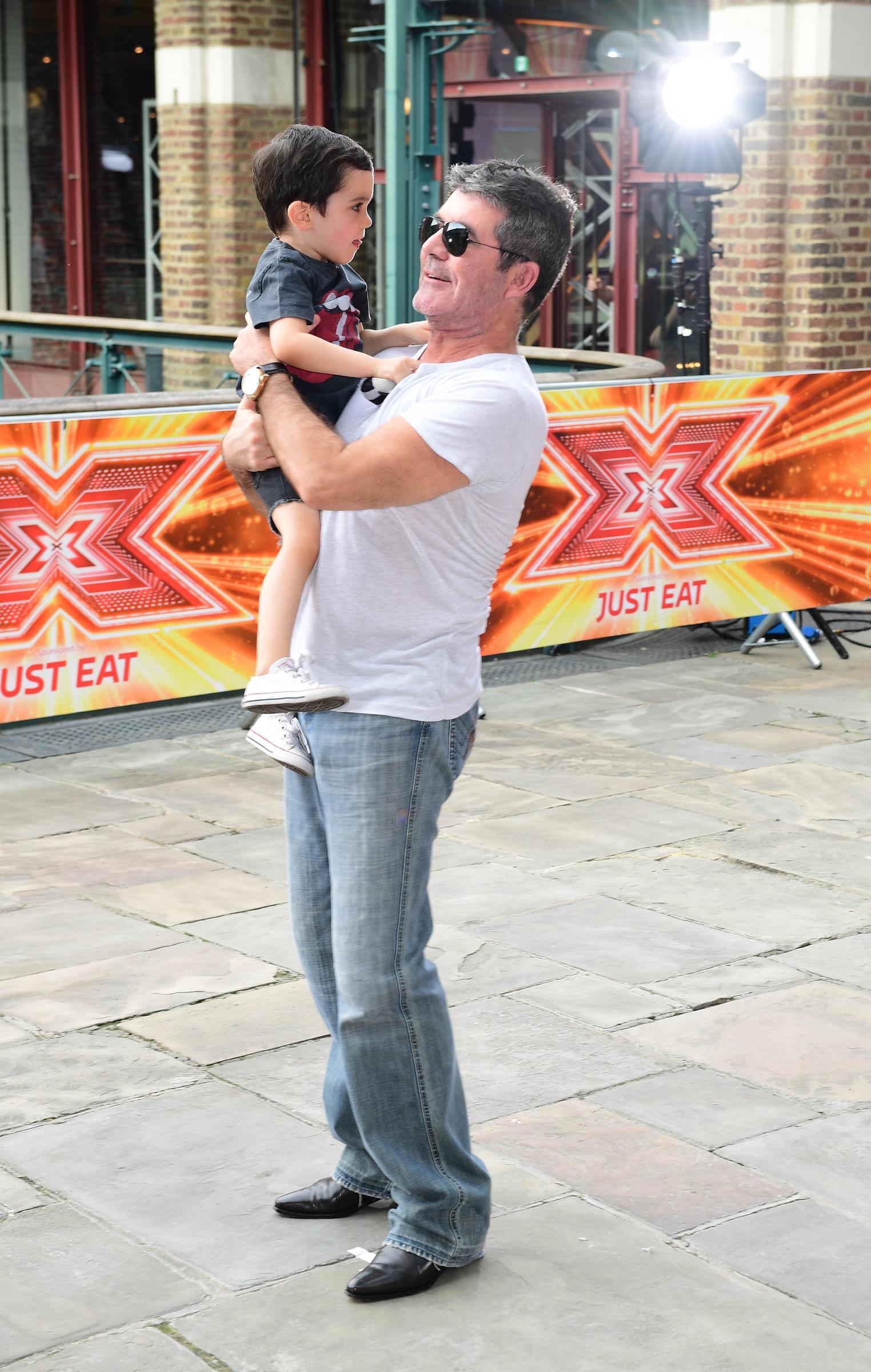 Eric and Simon Cowell during the filming of