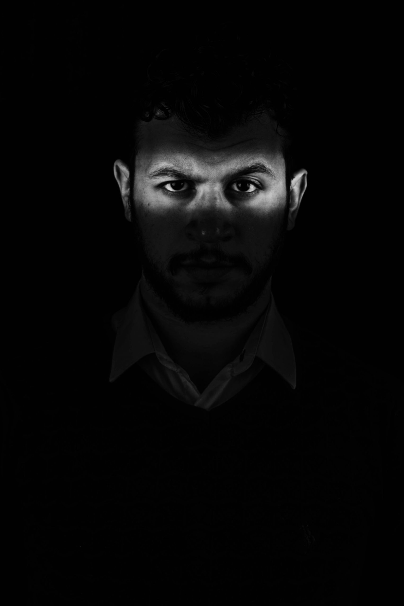 A focus on an upset man's eyes | Source: Unsplash