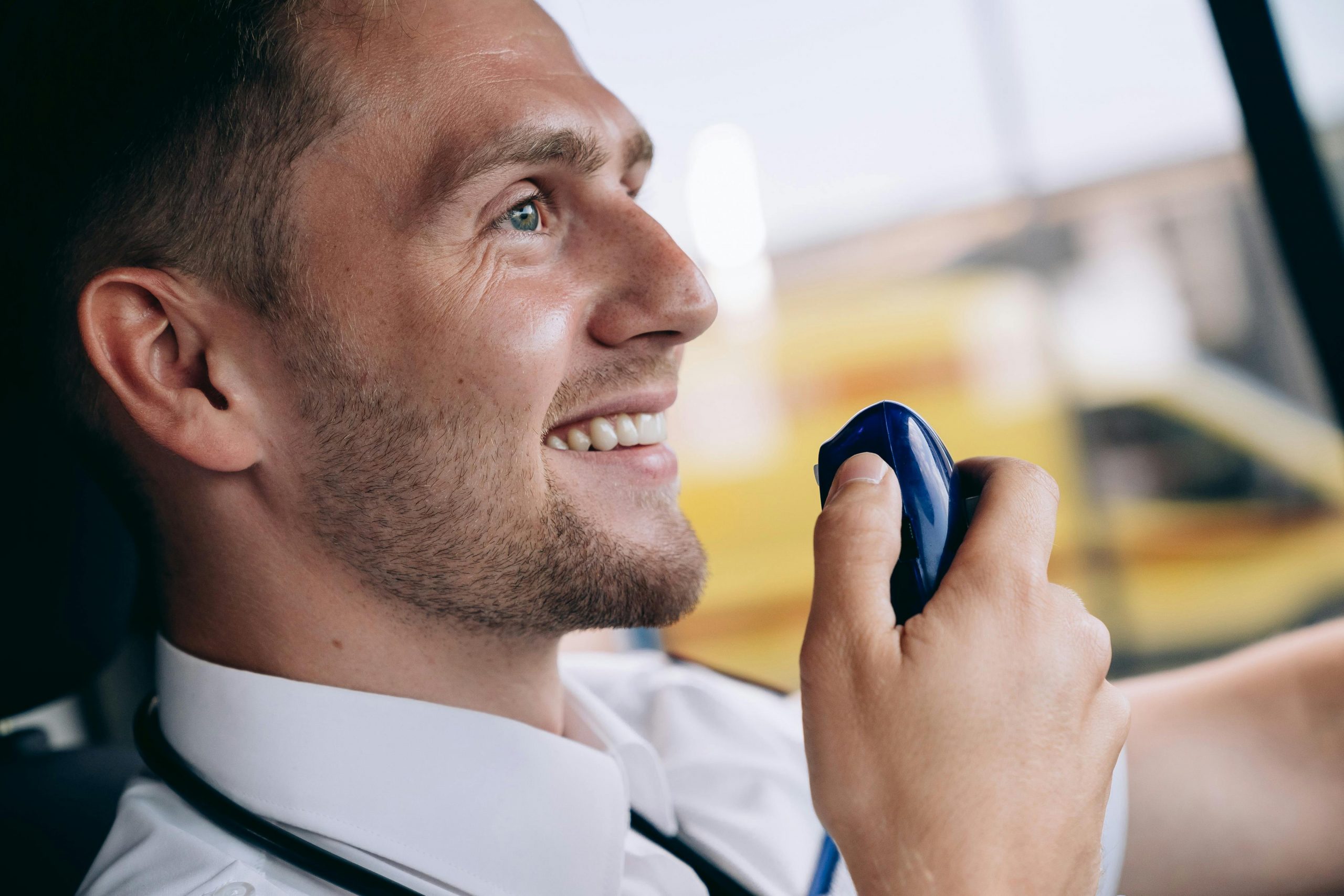 A man talking on a VHF Radio | Source: Pexels