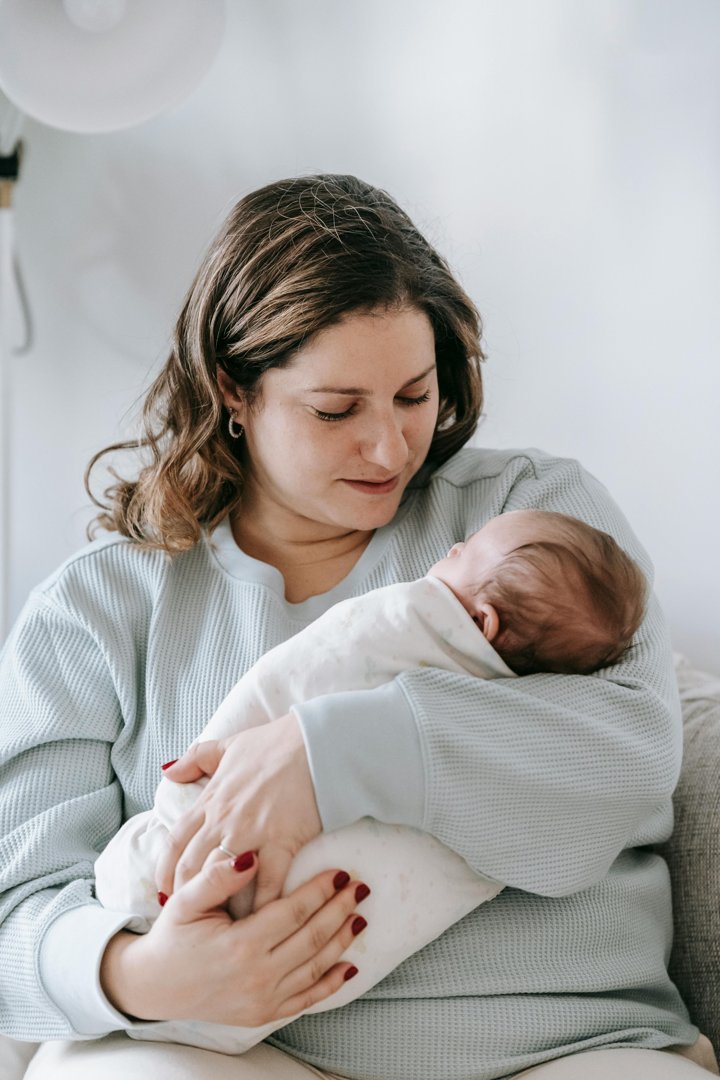 A mother with her newborn baby | Source: Pexels