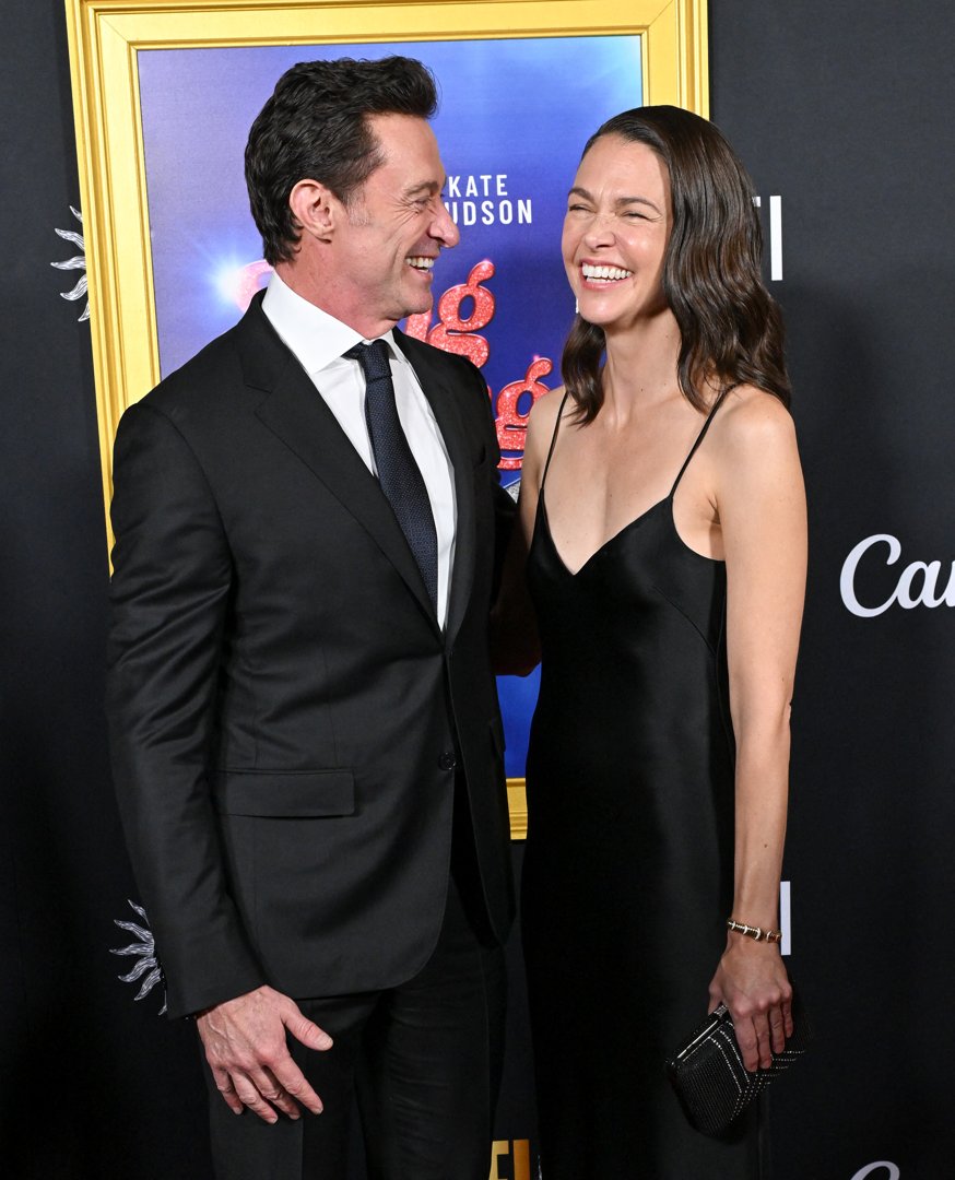 A woman folding laundry | Source: Midjourney