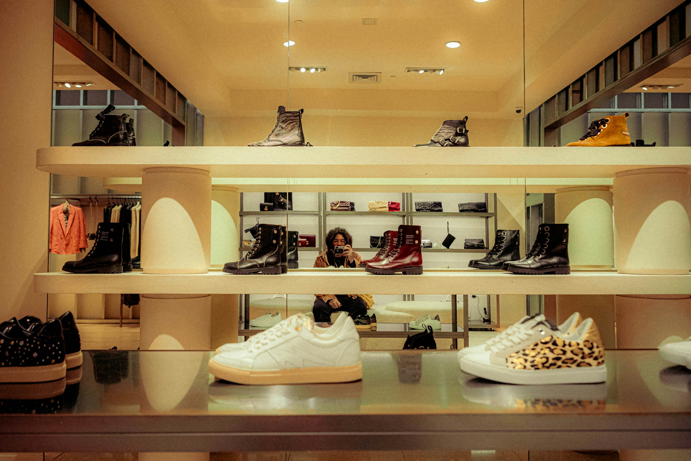 A display of footwear in a shoe store | Source: Unsplash