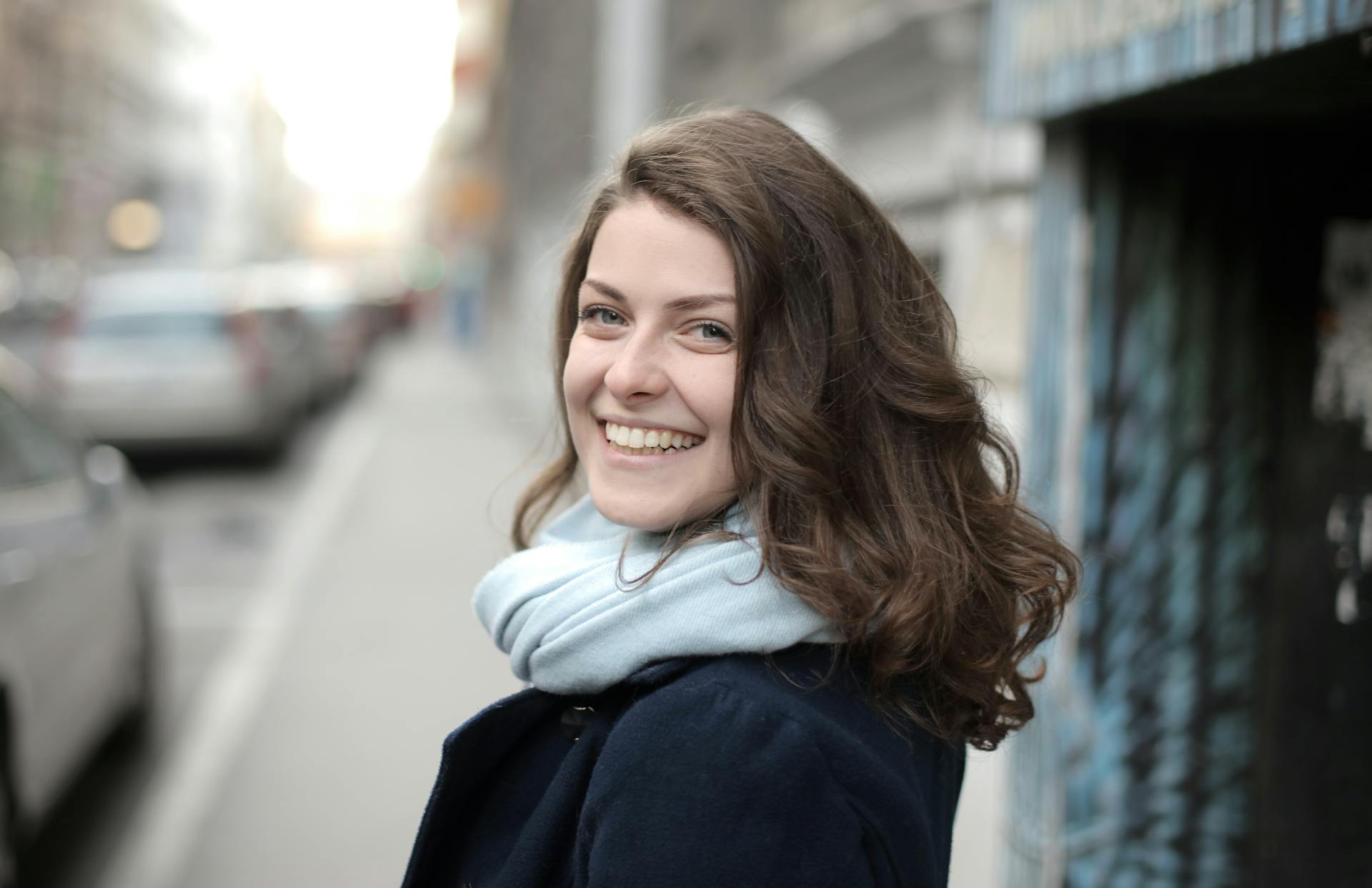 A young woman smiling | Source: Pexels