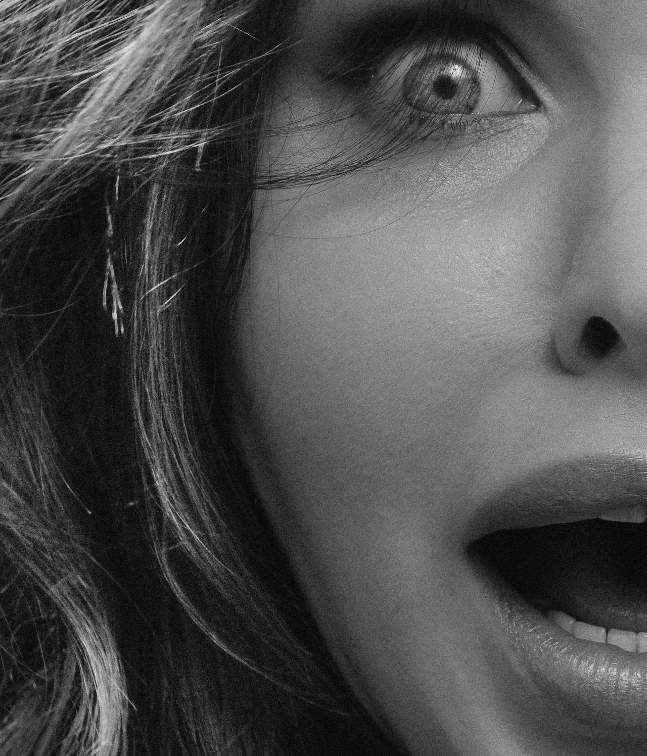 Grayscale shot of a stunned woman | Source: Pexels