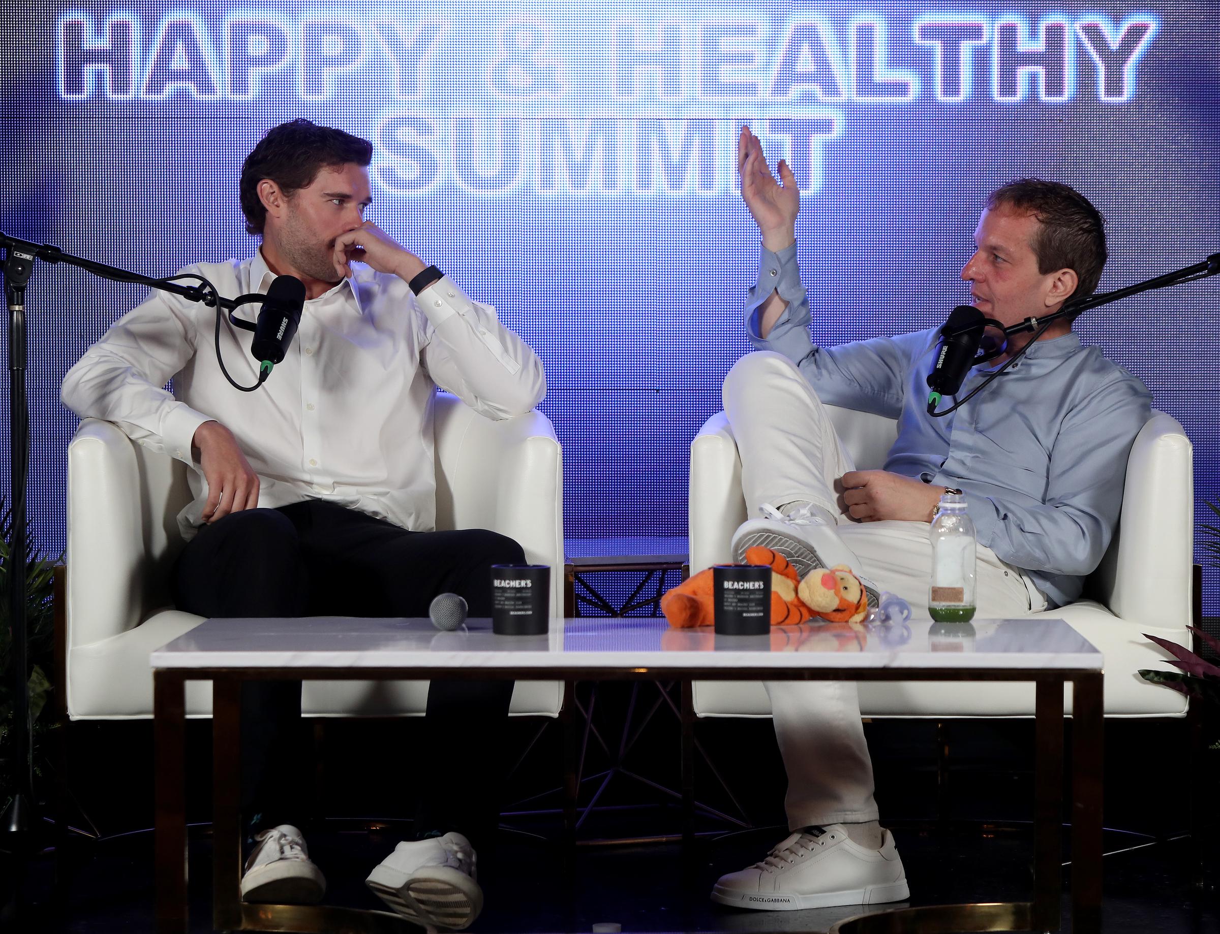 Christopher Schwarzenegger and Jeff Beacher speaking at the health summit. | Source: Getty Images