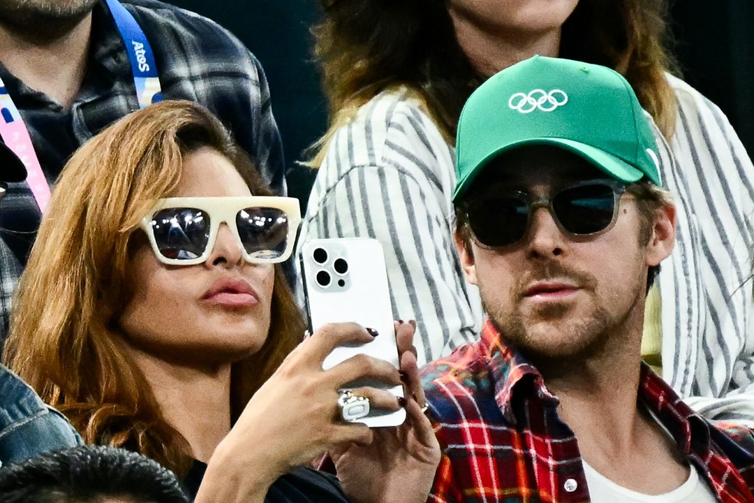 Eva Mendes and Ryan Gosling at the Artistic Gymnastics Women's Uneven Bars Final during the Paris 2024 Olympic Games on August 4 in France. | Source: Getty Images
