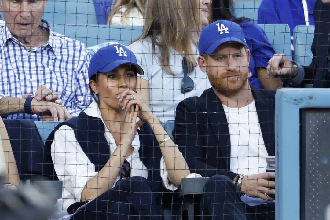 Prince Harry, Duke of Sussex and Meghan, Duchess of Sussex react during game four of the 2025 World Series between the Toronto Blue Jays and the Los Angeles Dodgers at Dodger Stadium on October 28 in Los Angeles, California | Source: Getty Images
