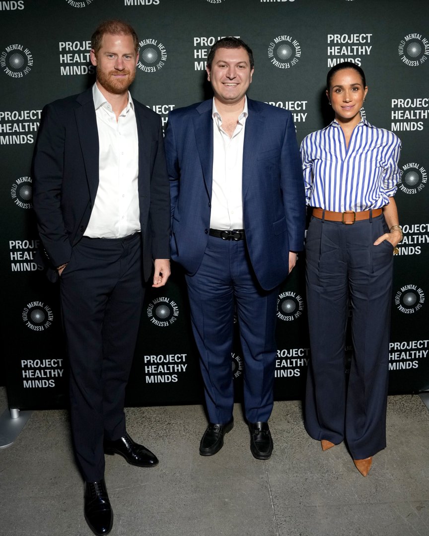 Prince Harry and Meghan Markle with Phil Schermer at Project Healthy Minds' World Mental Health Day Festival in New York on October 10, 2025. | Source: Getty Images