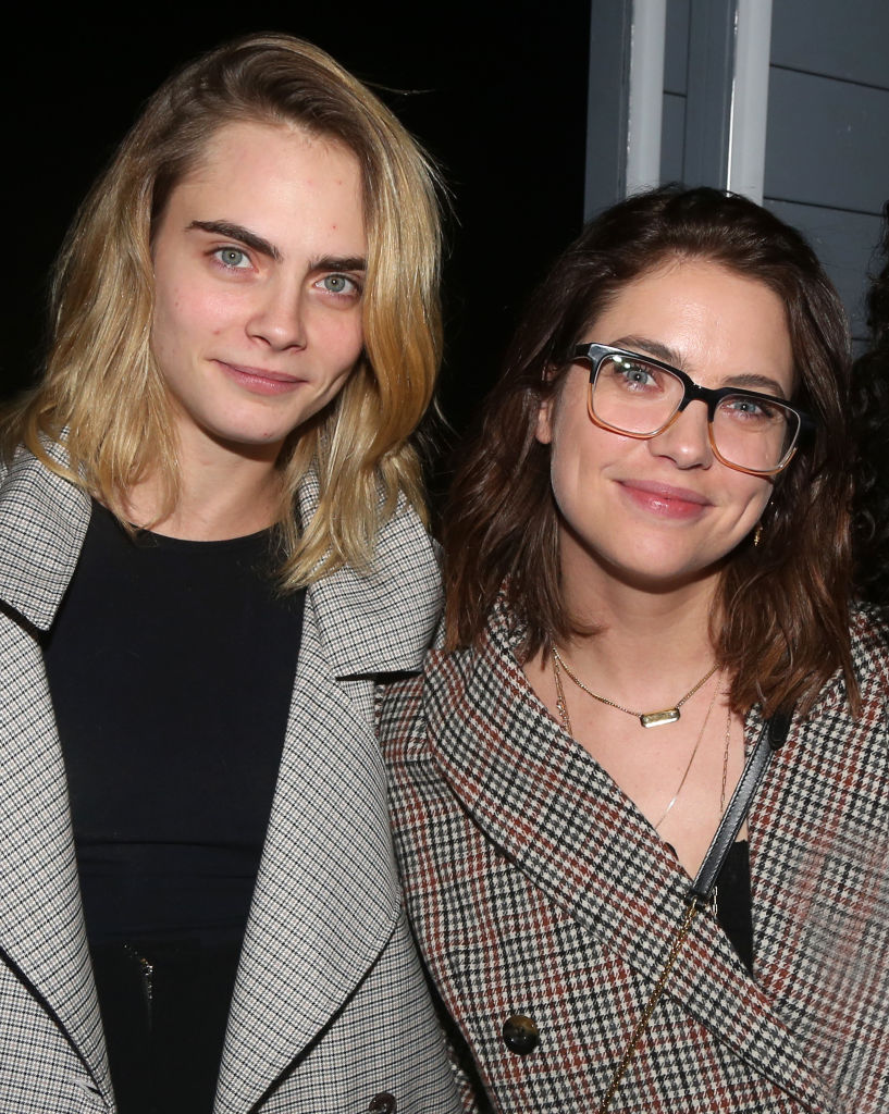 Cara Delevingne and Ashley Benson pose backstage at the new Alanis Morissette musical
