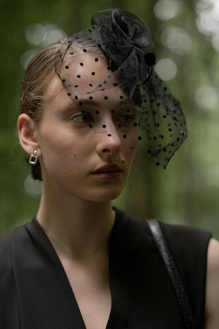 A woman in her house | Source: Midjourney