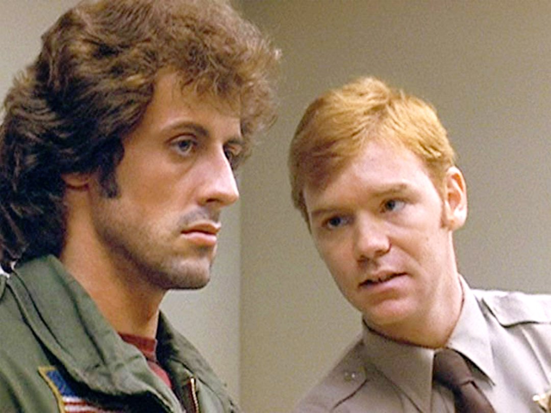Sylvester Stallone as John Rambo and David Caruso as Deputy Mitch in