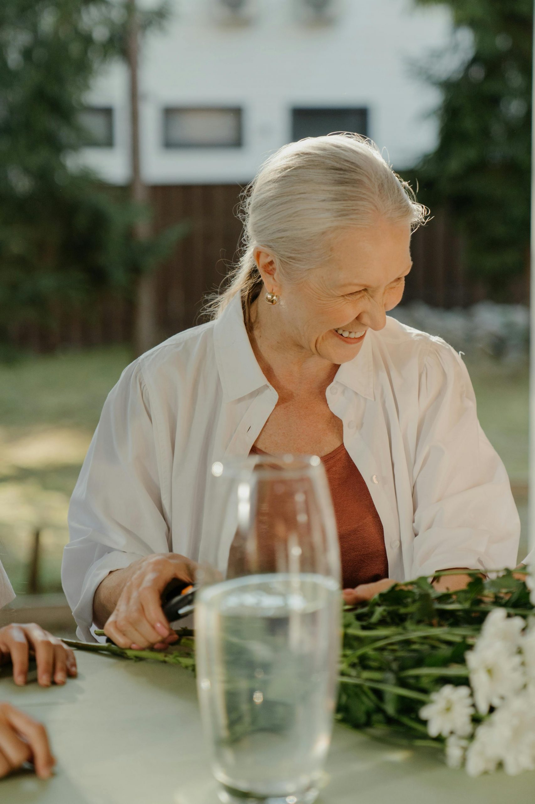 A smiling older woman | Source: Pexels