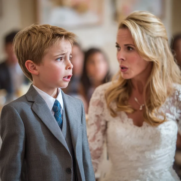 A bride scolding a boy at a wedding | Source: Midjourney