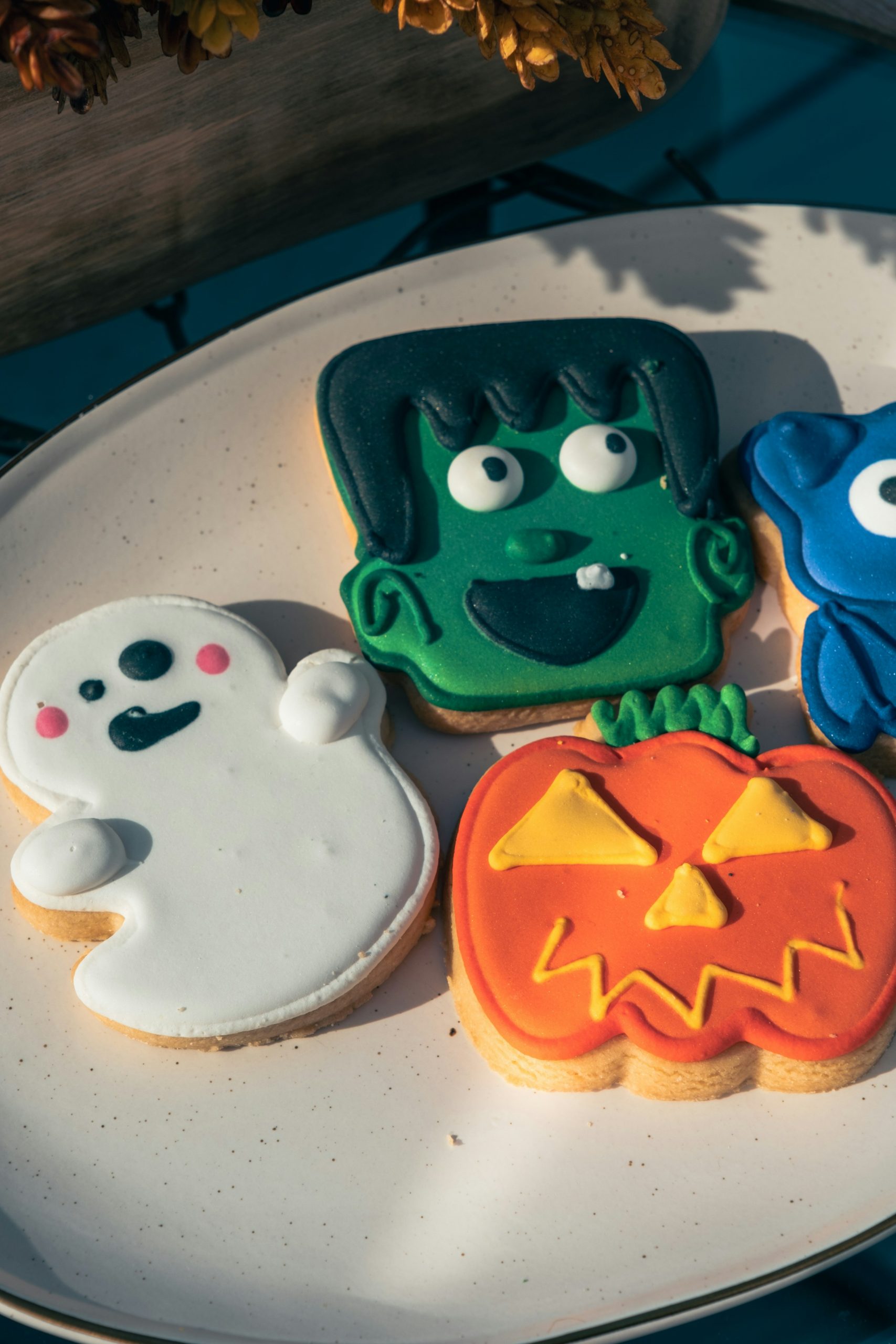 Halloween-themed cookies served on a plate | Source: Unsplash