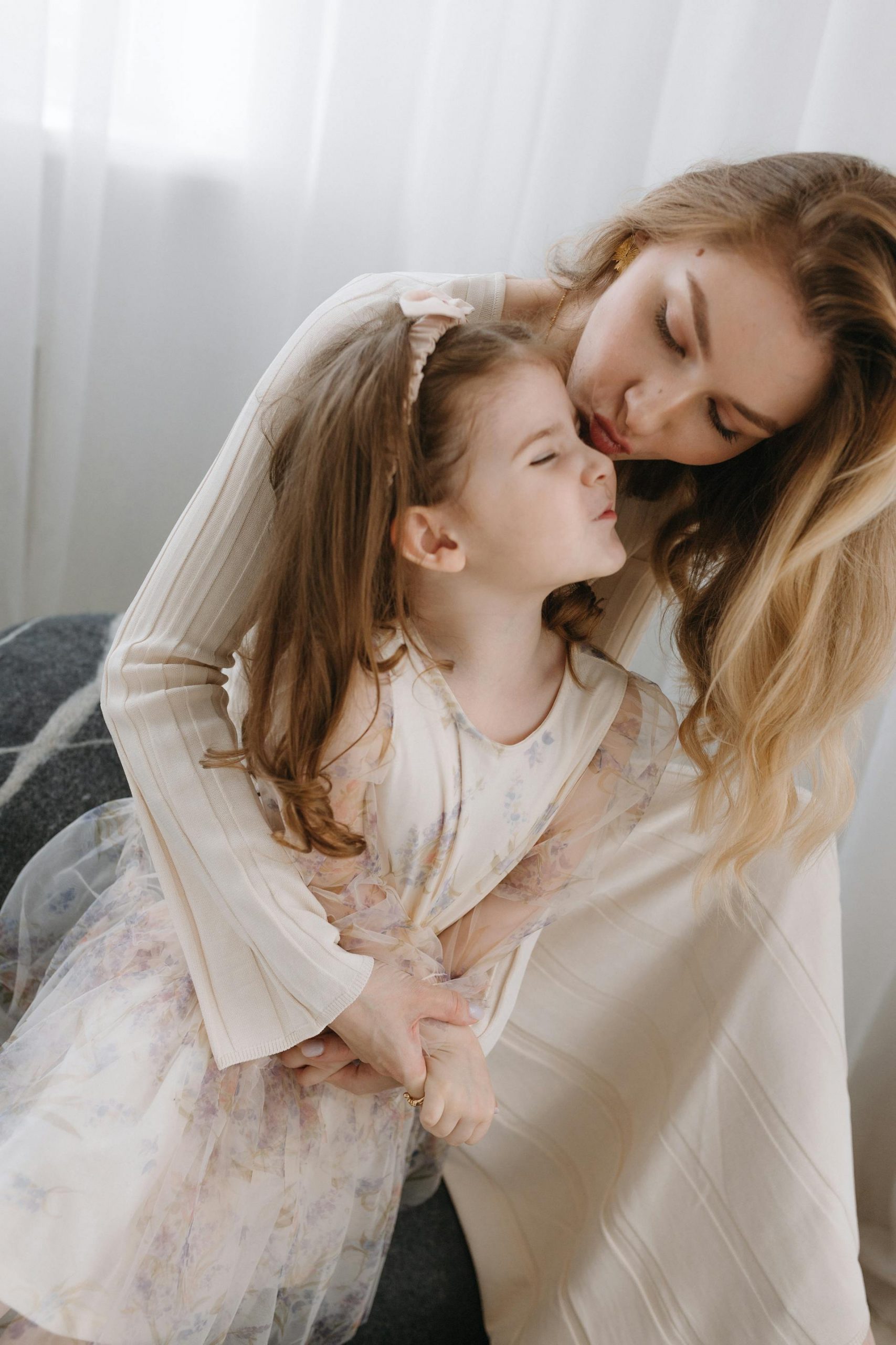 A mother-daughter duo shares a sweet moment | Source: Pexels