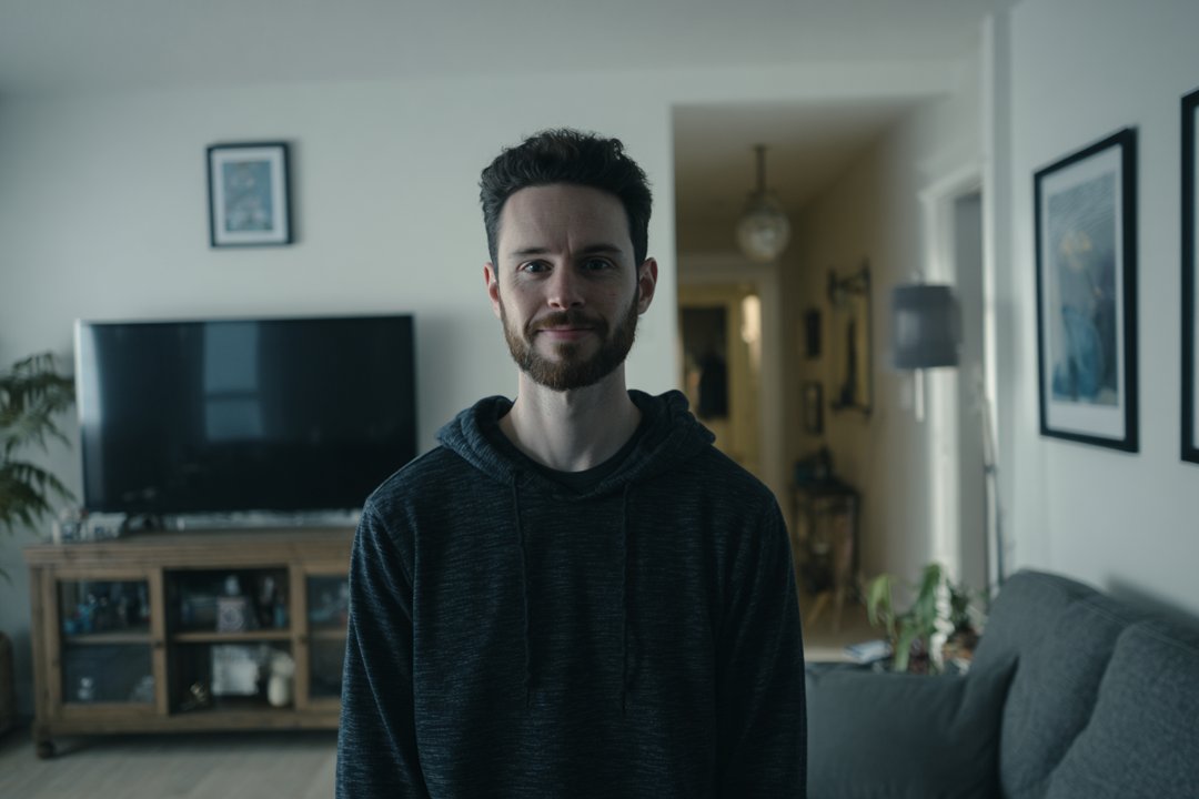 A man standing in his house | Source: Midjourney