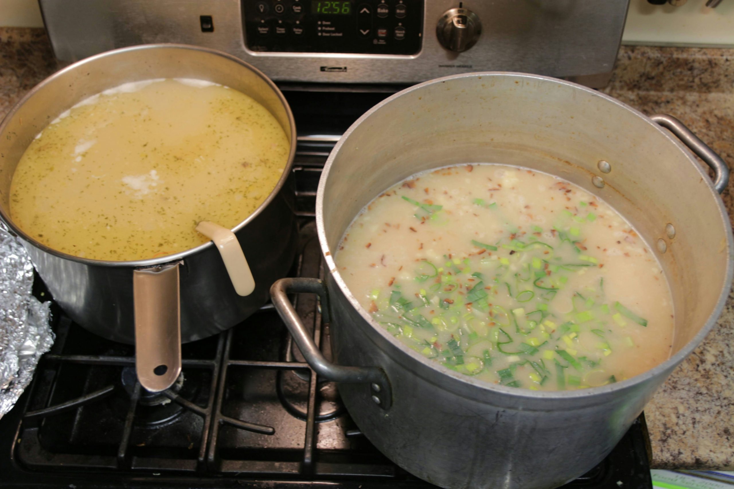 Large pots of soup on a stove | Source: Unsplash