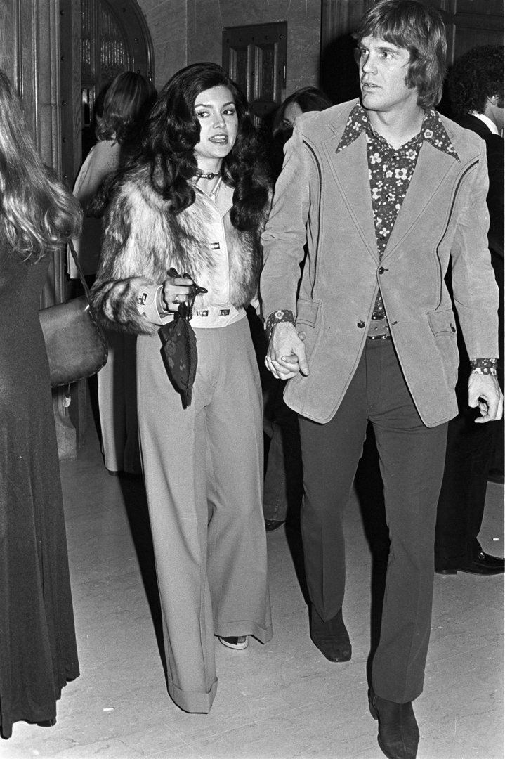 Victoria Principal and Lance Rentzel at a party thrown by Hugh Hefner at The Playboy Mansion in an undated photo | Source: Getty Images