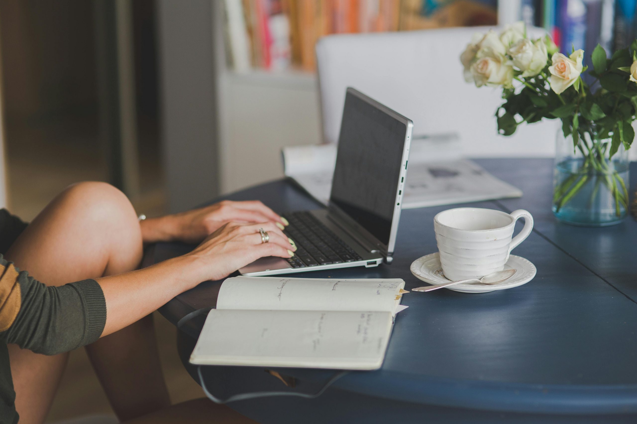 A woman working on a laptop | Source: Pexels