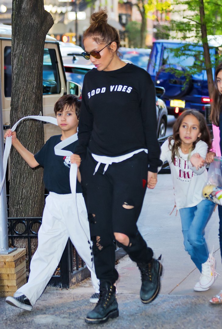 Jennifer Lopez walks hand in hand with Max and Emme as they head to Cipriani for dinner in New York City. The twins look cheerful and full of energy, matching their mom’s casual style as they enjoy their night out together.