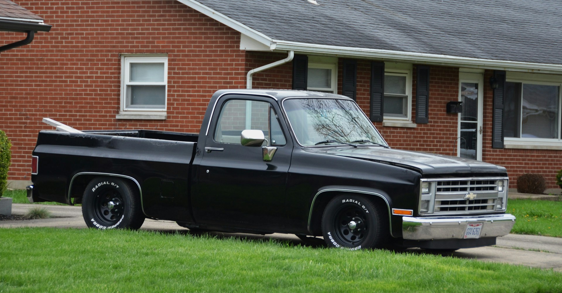 A black pickup truck on the driveway | Source: Unsplash