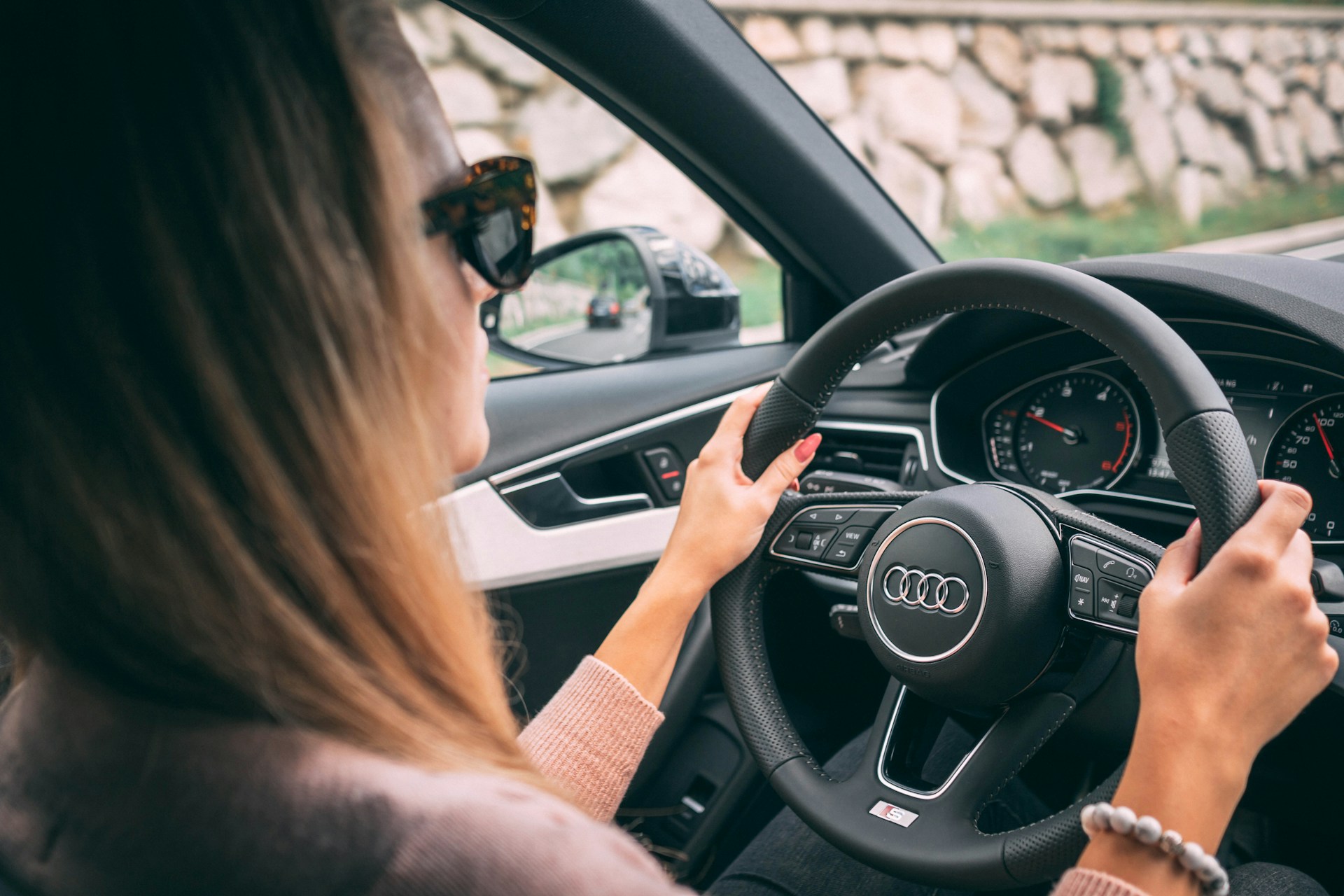 A woman driving her car | Source: Unsplash